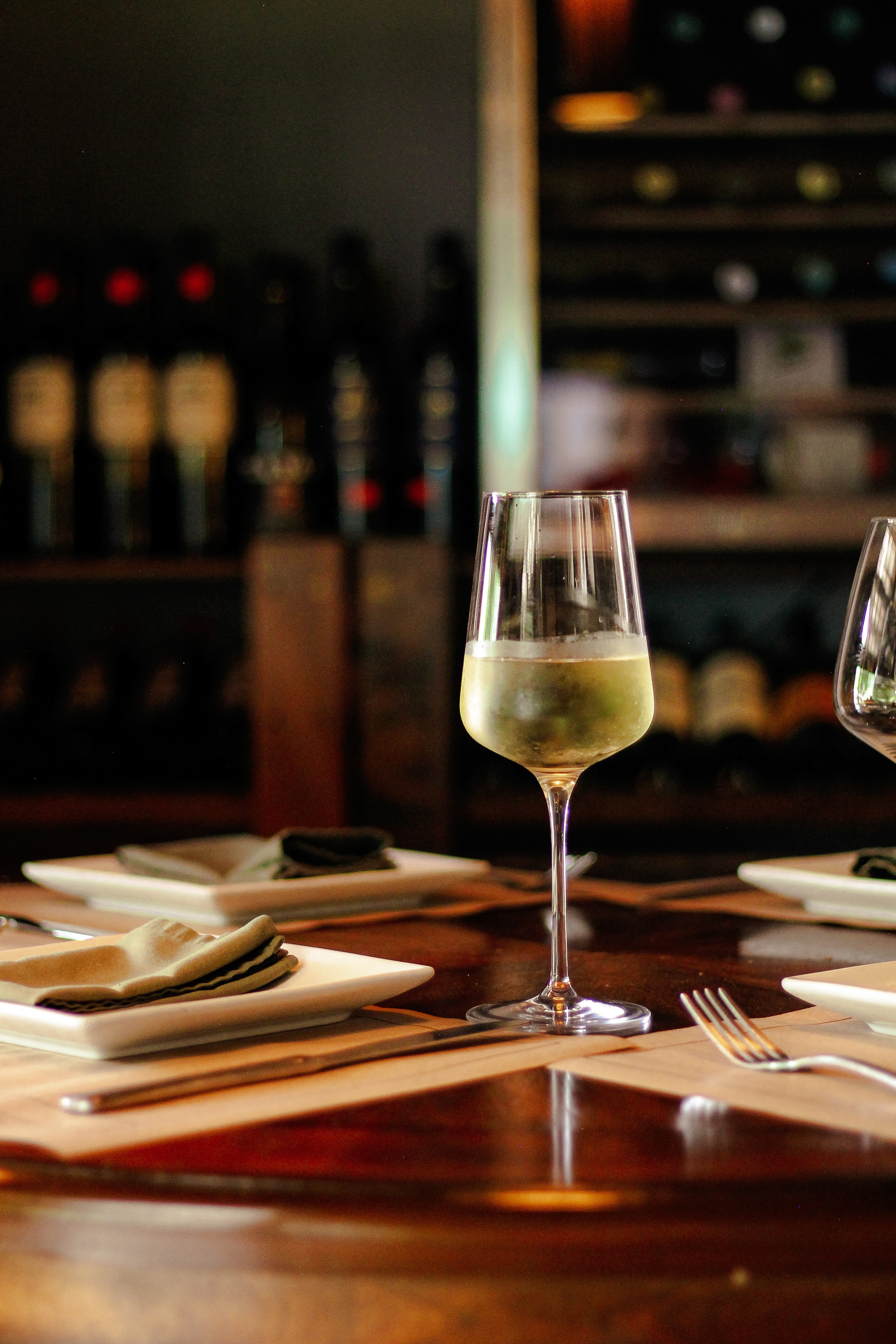 Friends celebrating around a table at La Pista